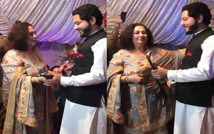 netizens question how mother in law gave ak 47 gift to son in law in pakistani wedding