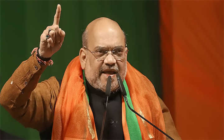 amit shah again hits out at tmc in jhargram virtual meeting