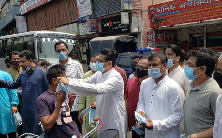 awami leagues mask distribution program in dhaka