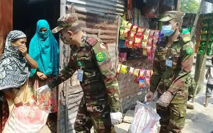 distribution of relief materials of bangladesh army in rajshahi at bangladesh