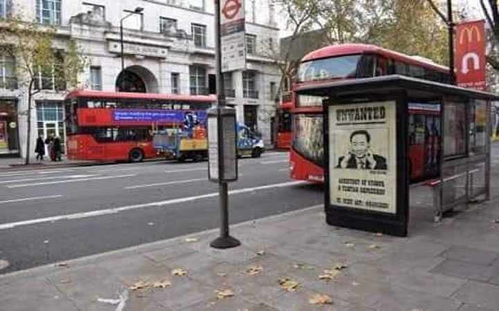 hoardings on london streets for demanding arrest in secretary of chinese communist party